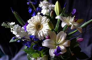 white Lilies and Daisies with purple flowers arrangement