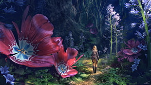 woman in black long-sleeved shirt walking beside giant red petaled flower