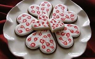 white and red ceramic heart decors