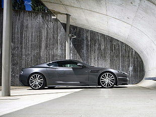 gray Aston martin coupe on gray concrete HD wallpaper