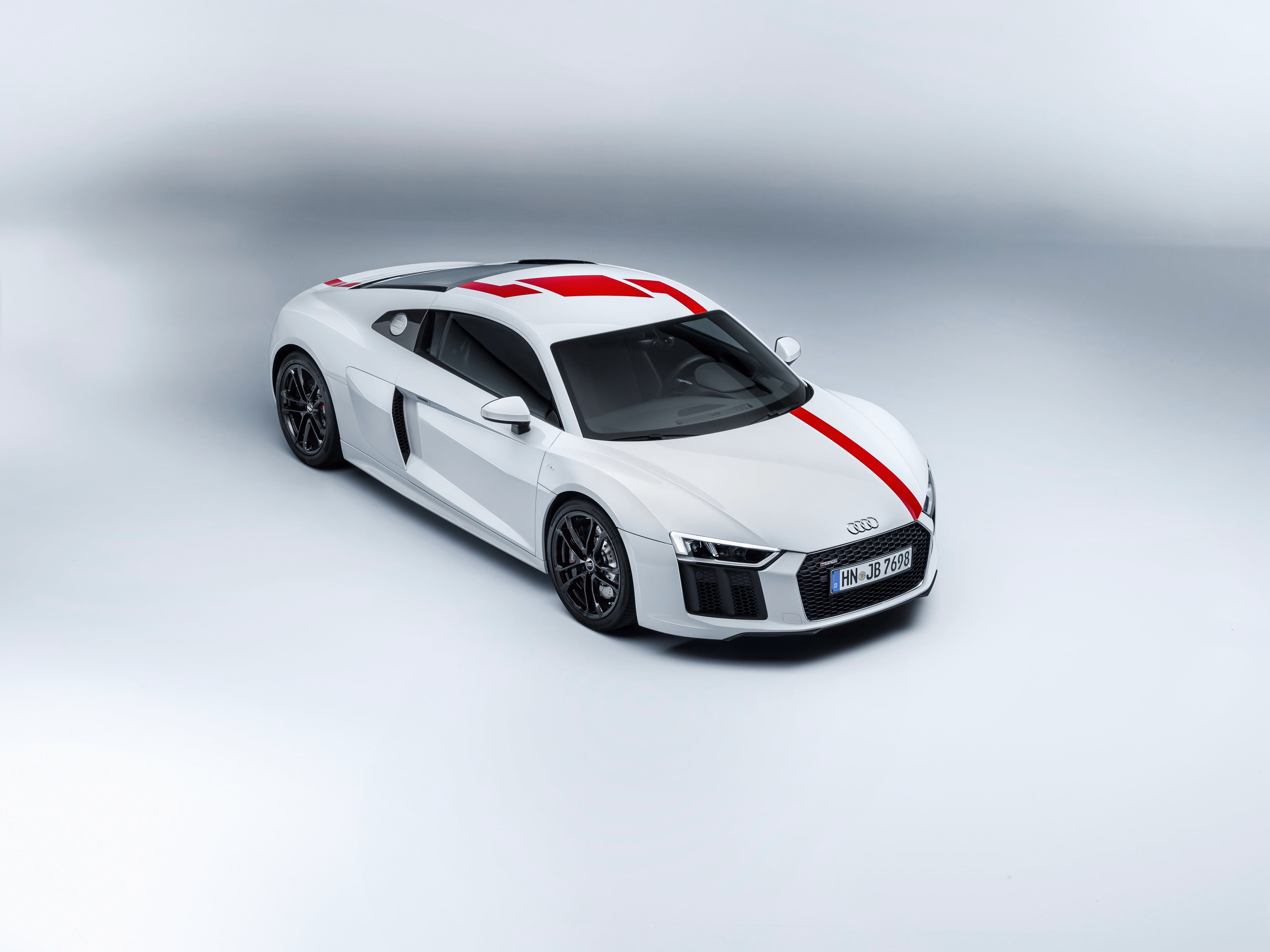 white and red Audi miniature coupe