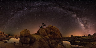 landscape photography of rocky mountain and stars