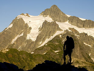 man's silhouette with mountain backpack on top of mountain peak HD wallpaper