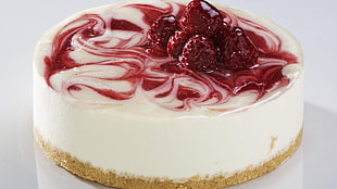 strawberry cheesecake with raspberry toppings