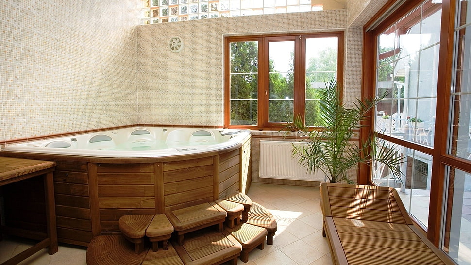 hot tub beside lounger chair HD wallpaper