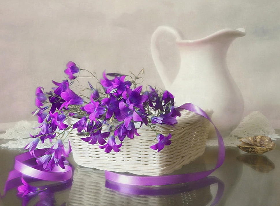 white wicker basket of purple Petunia flowers beside white ceramic pitcher on table HD wallpaper