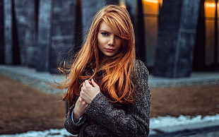 brown haired woman wearing black sweater