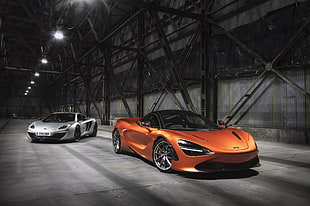 two orange and silver coupes