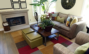 rectangular brown wooden center table near fireplace