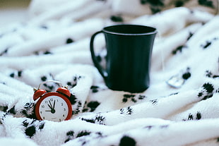 green ceramic mug, Alarm clock, Watch, Plaid