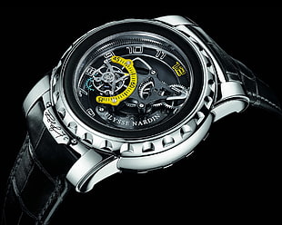 round black and silver-colored Ulysse Nardin mechanical watch