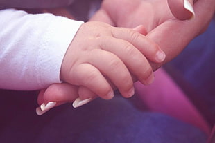 baby's right human hand HD wallpaper