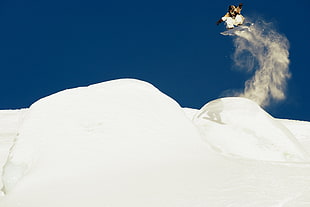 person riding snowboard in the air, snow, snowboarding, sport , winter