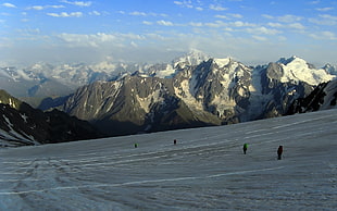 four people skiing on ice roads HD wallpaper