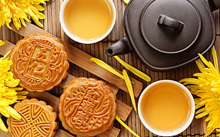 chinese moon cake on brown wooden trau