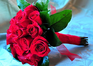 red Rose flower bouquet on white textile