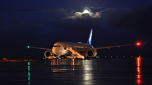 white airplane, airplane, night, lights, aircraft HD wallpaper