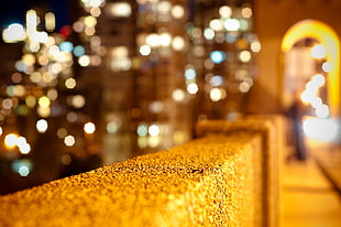 tilt shift lens photo of concrete wall during night time HD wallpaper