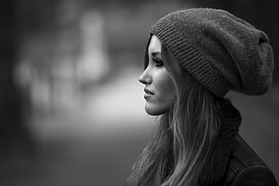 grayscale photography of side view of woman wearing knitted cap