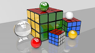 three rubik's cubes
