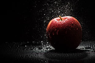 red apple with water droplets