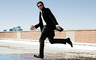 man wearing black suit HD wallpaper