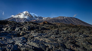 white and brown rocky mountain under blue sky, tolbachik, kamchatka