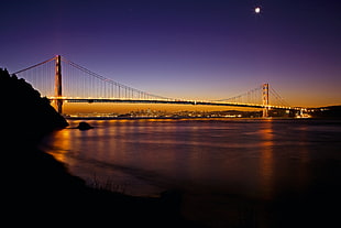 lighted bridge at nighttime