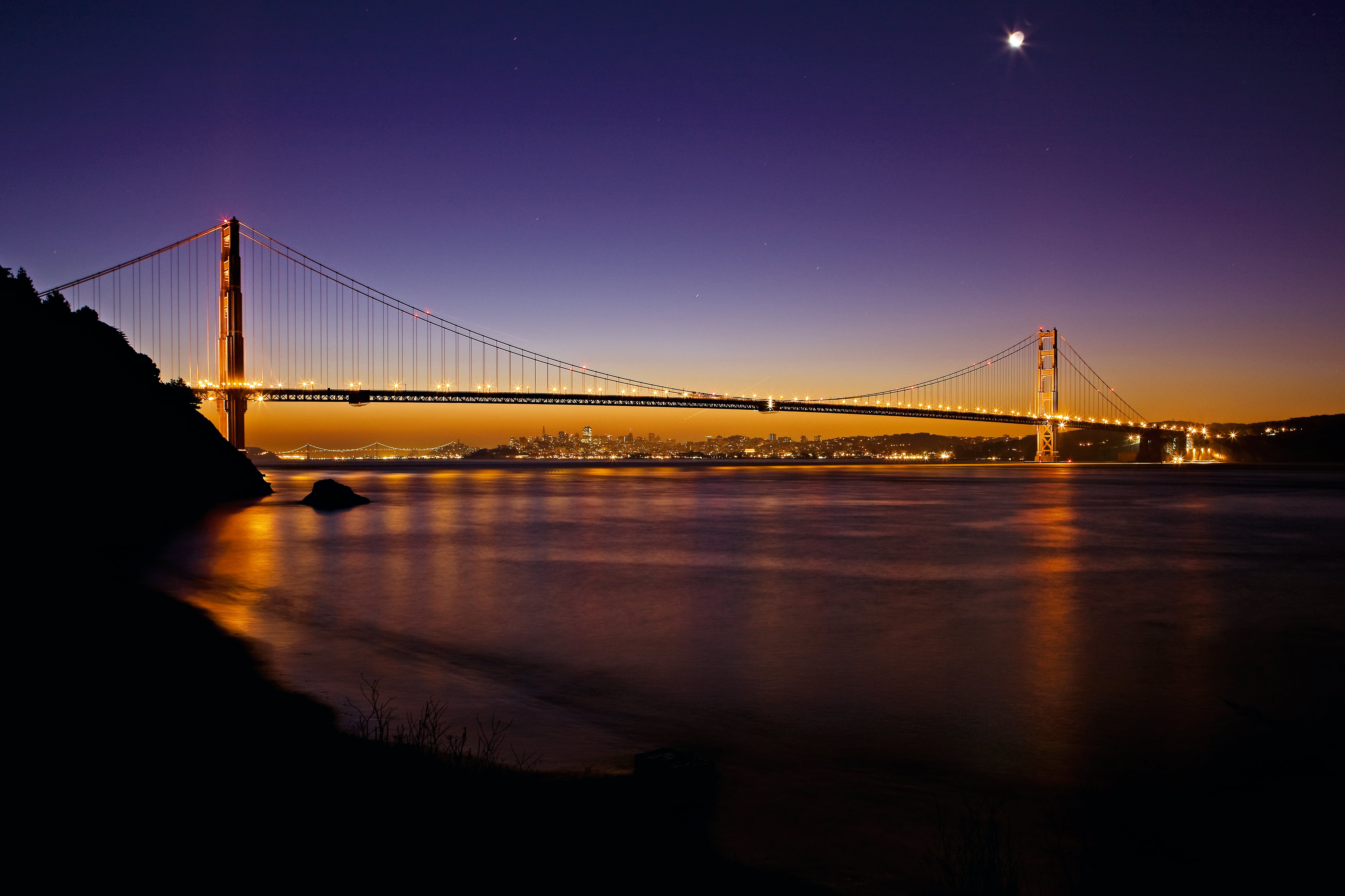 lighted bridge at nighttime