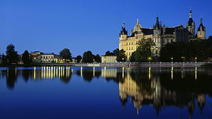 castle near at body of water HD wallpaper