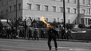 selective color photography of man facing soldier HD wallpaper