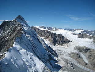 aerial photography of alps with snow