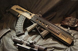 photo of black and brown assault rifle with tactical scope and gloves HD wallpaper