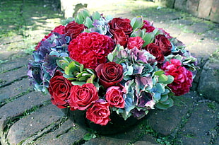 bouquet of flowers on green container