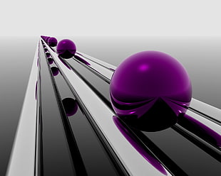 closeup photo of purple ball on stainless steel dar