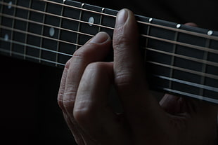 person playing guitar HD wallpaper