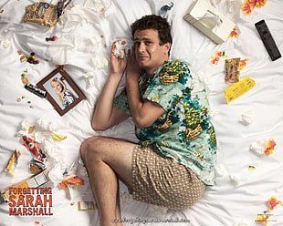man on bed with candy wrappers and framed photo of woman HD wallpaper