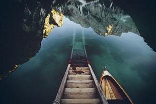 stairs passing through water beside boat HD wallpaper