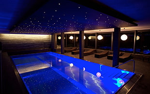 blue and white starry ceiling decal on top of pool
