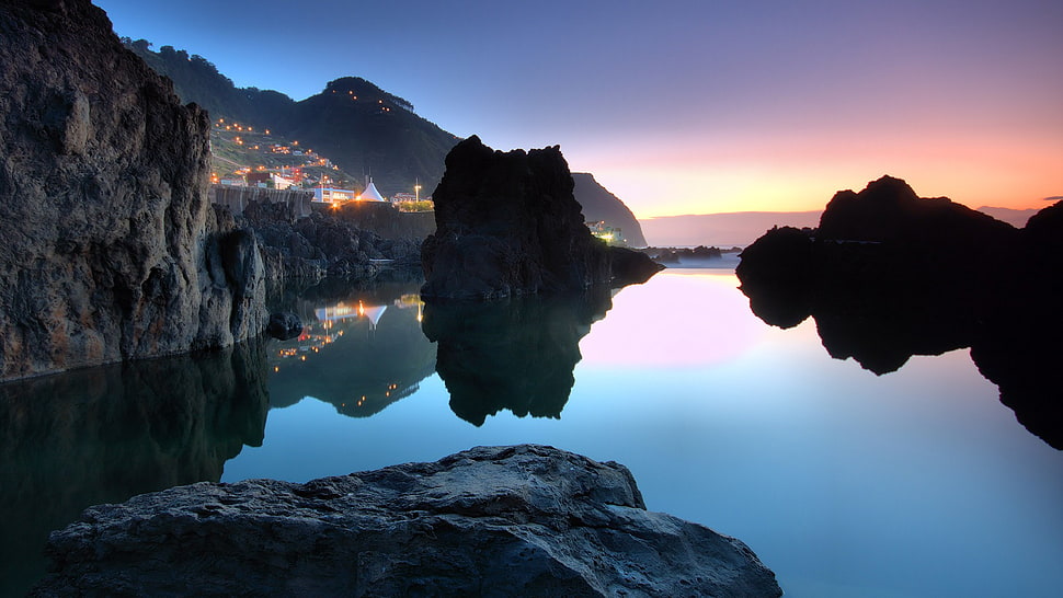 water surrounded by rock formations, landscape, water, reflection, sky HD wallpaper