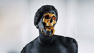 human black and gold statue