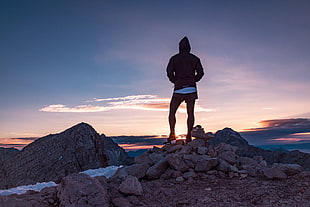 standing person facing the sunset HD wallpaper