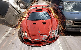 red sports car crashes between cars HD wallpaper