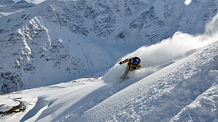 men's yellow snow jacket, snowboarding, mountains