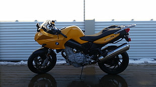 yellow and black BMW sports bike on road at daytime HD wallpaper