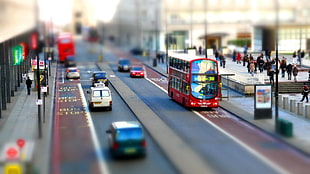 red bus, cityscape, blurred, car, England