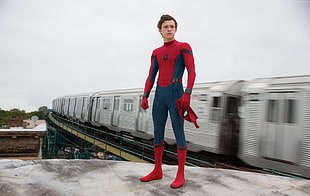 Spider-Man standing near train during daytime HD wallpaper
