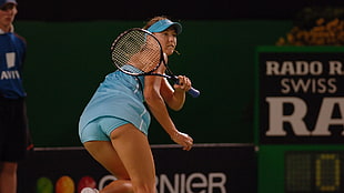 female tennis player in action HD wallpaper