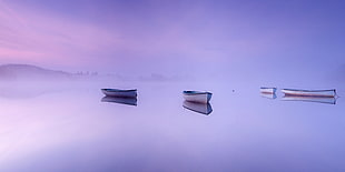 boat on body of water during daytime HD wallpaper