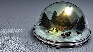 clear glass snow globe with hut, toys, santa